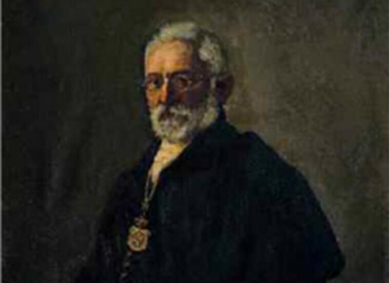 MIGUEL DE UNAMUNO (Con traje académico, retratado en 1914 por Vidal González Arenal. Salón de retratos de la Universidad de Salamanca).